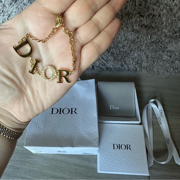 New Dior Revolution Bracelet Gold Metal with white crystals - Picture 1 of 7